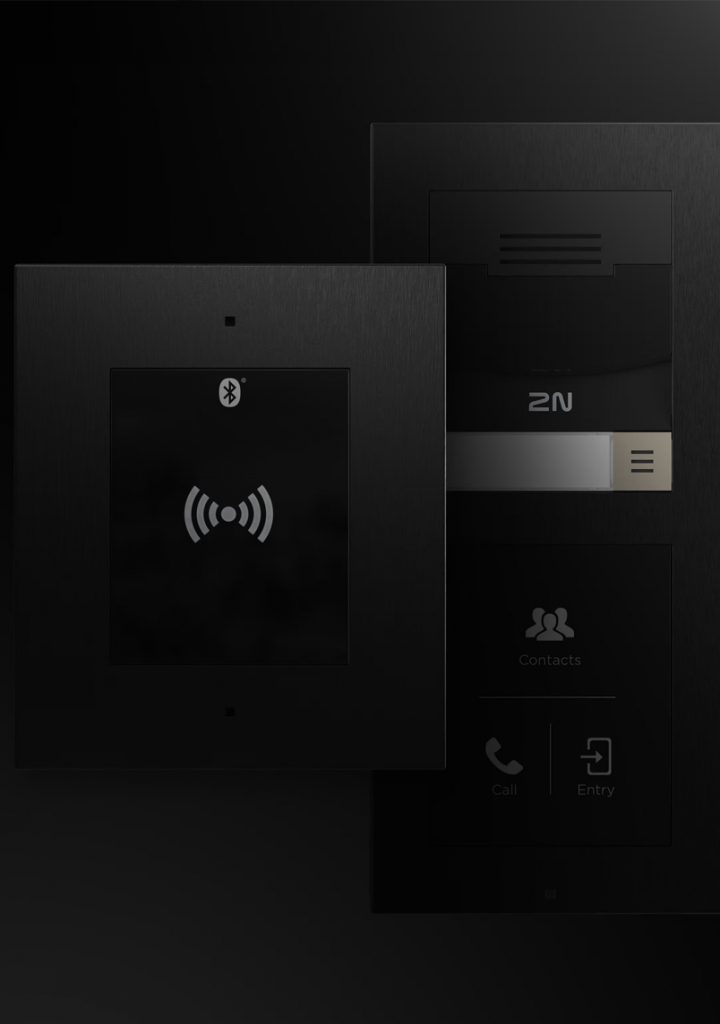 2N access reader and 2N IP intercom panel on a black background