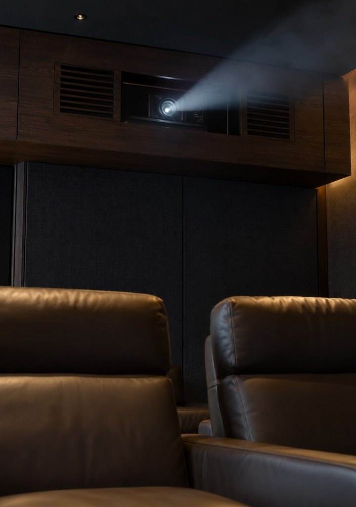Cinema projector in a hatch above the back row