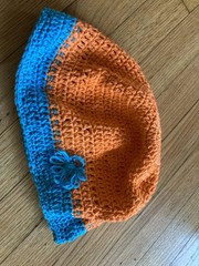 handmade by the seller, crocheted orange and blue hat for women, medium size