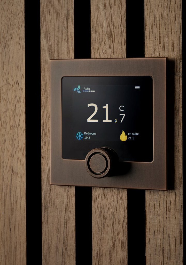 Polar Bear Design Ursium thermostat in copper on oak slats, showing temperature and humidity